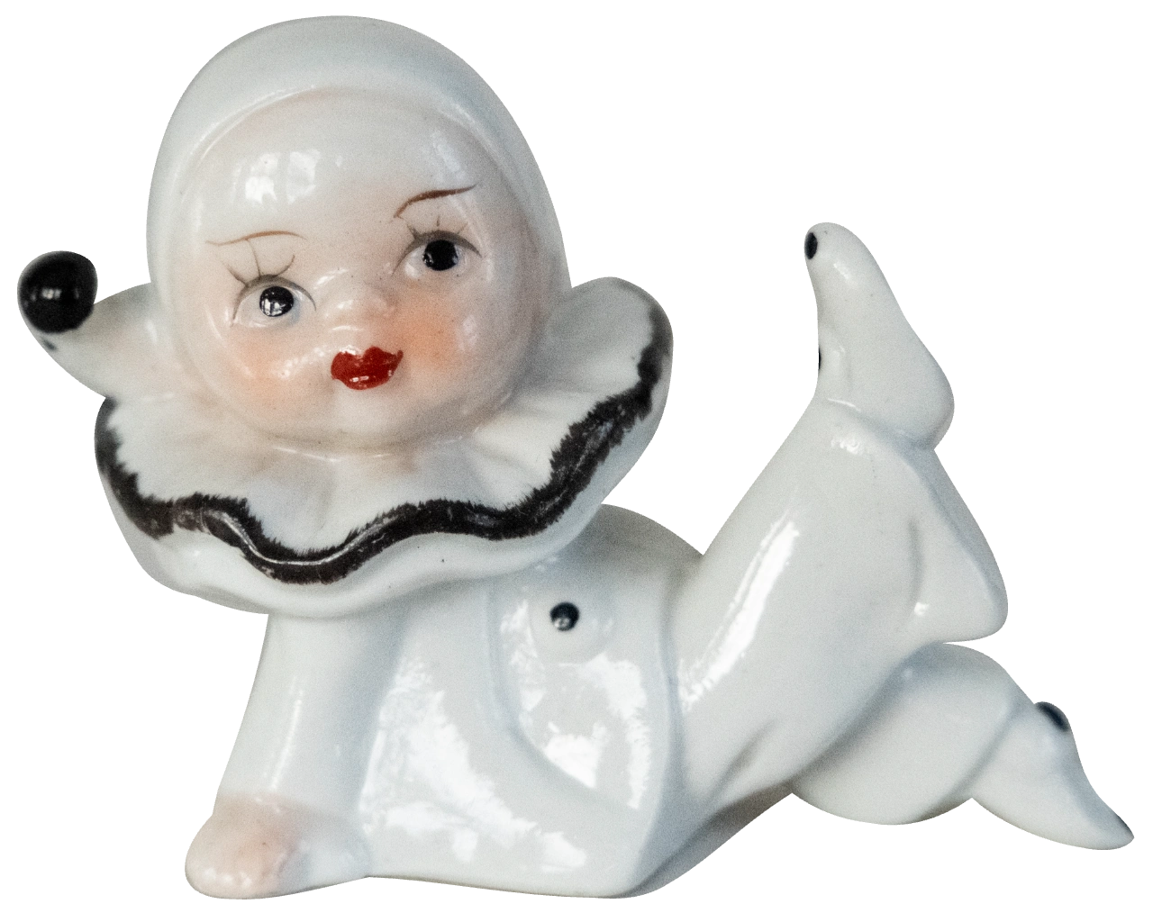 Reclining vintage white Pierrot figurine with a black ruffled collar